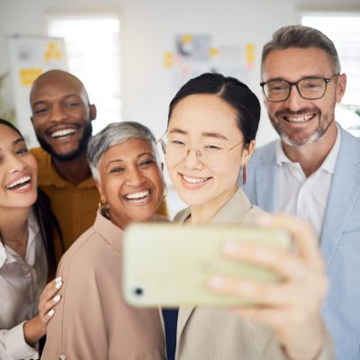 selfie-smile-and-group-of-business-people-in-offi-2023-11-27-05-19-28-utc-min